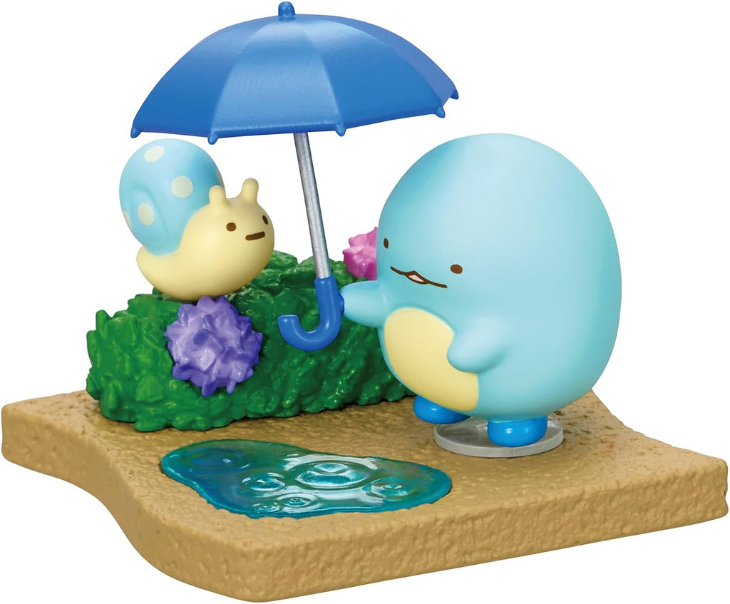Sumikko Gurashi Walking on a Rainy Day Blind Box - Includes 1 of 8 Collectible Mini Figurines - Fun and Versatile Decoration